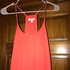 Orange tank top with gold accent straps